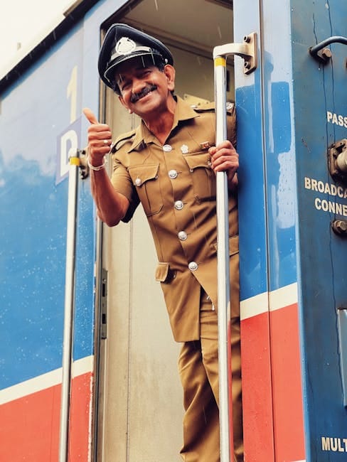 Sri Lankan train conductor - practical travel tip for getting around