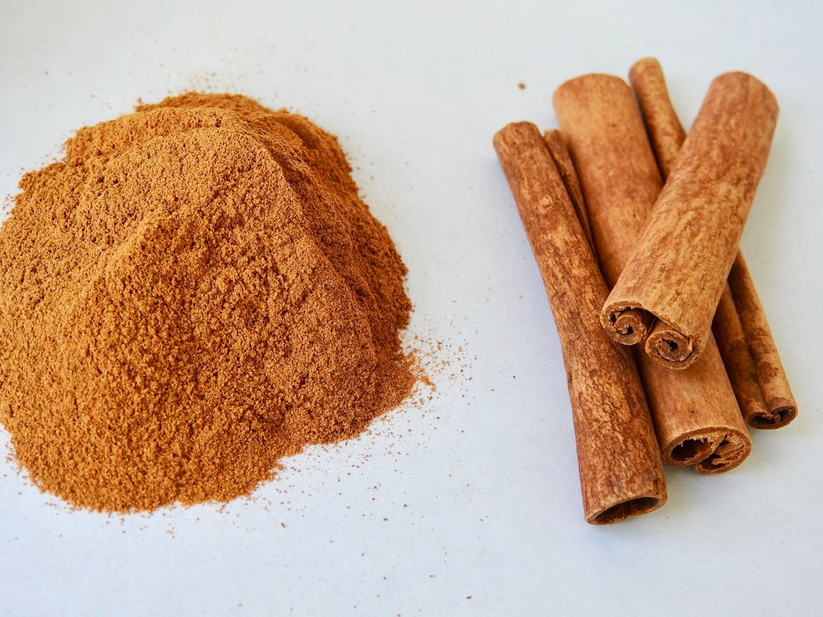 Close-up of aromatic cinnamon sticks and powder