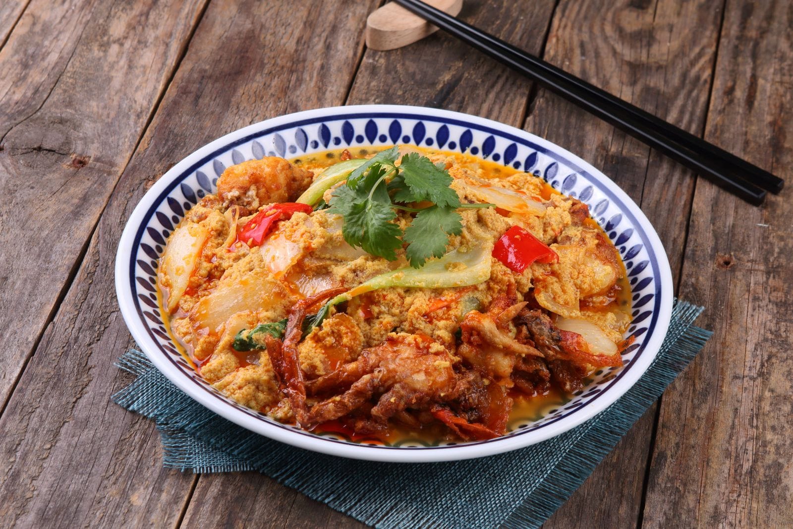 Asian crab curry with fresh vegetables