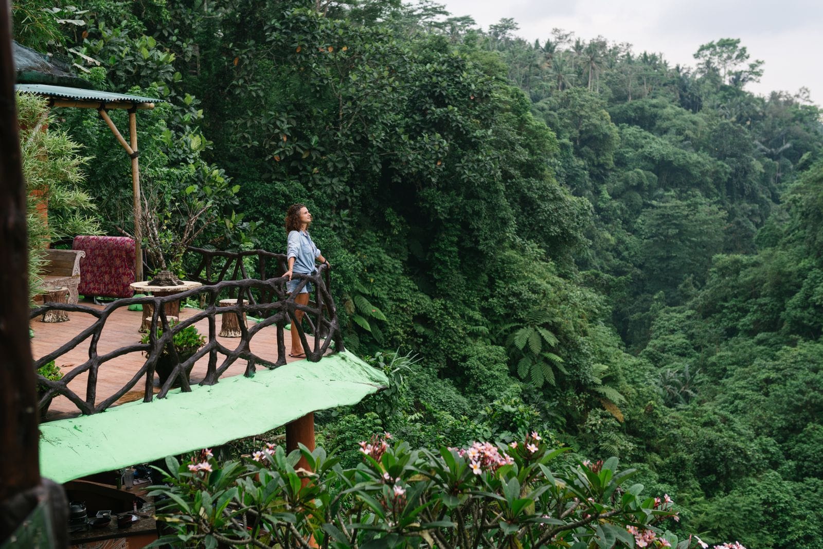 Eco lodge balcony overlooking lush tropical rainforest in Sri Lanka